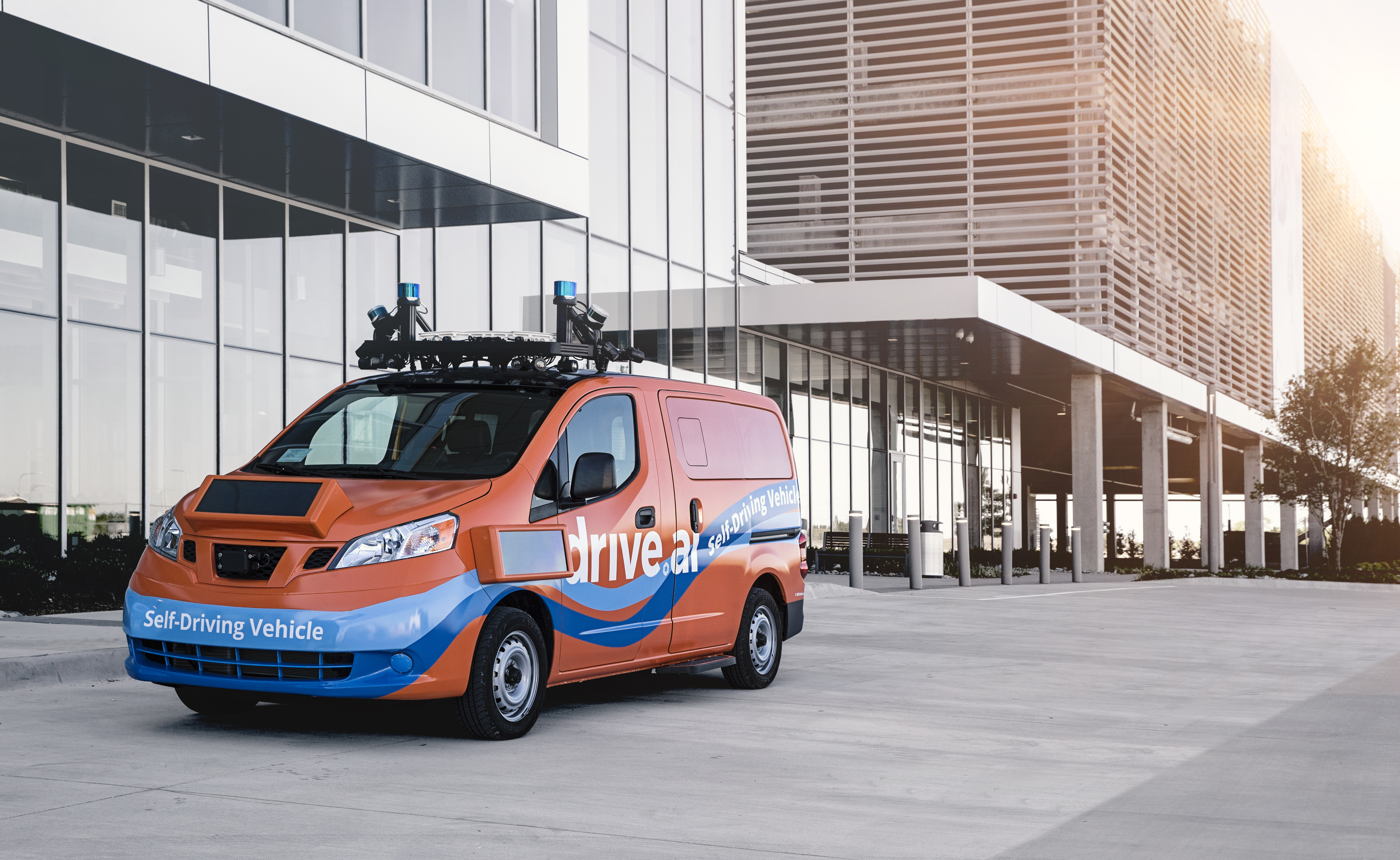 Image of orange drive.ai van