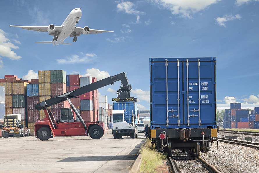Multiple modes of freight being displayed including air, train and shipping containers