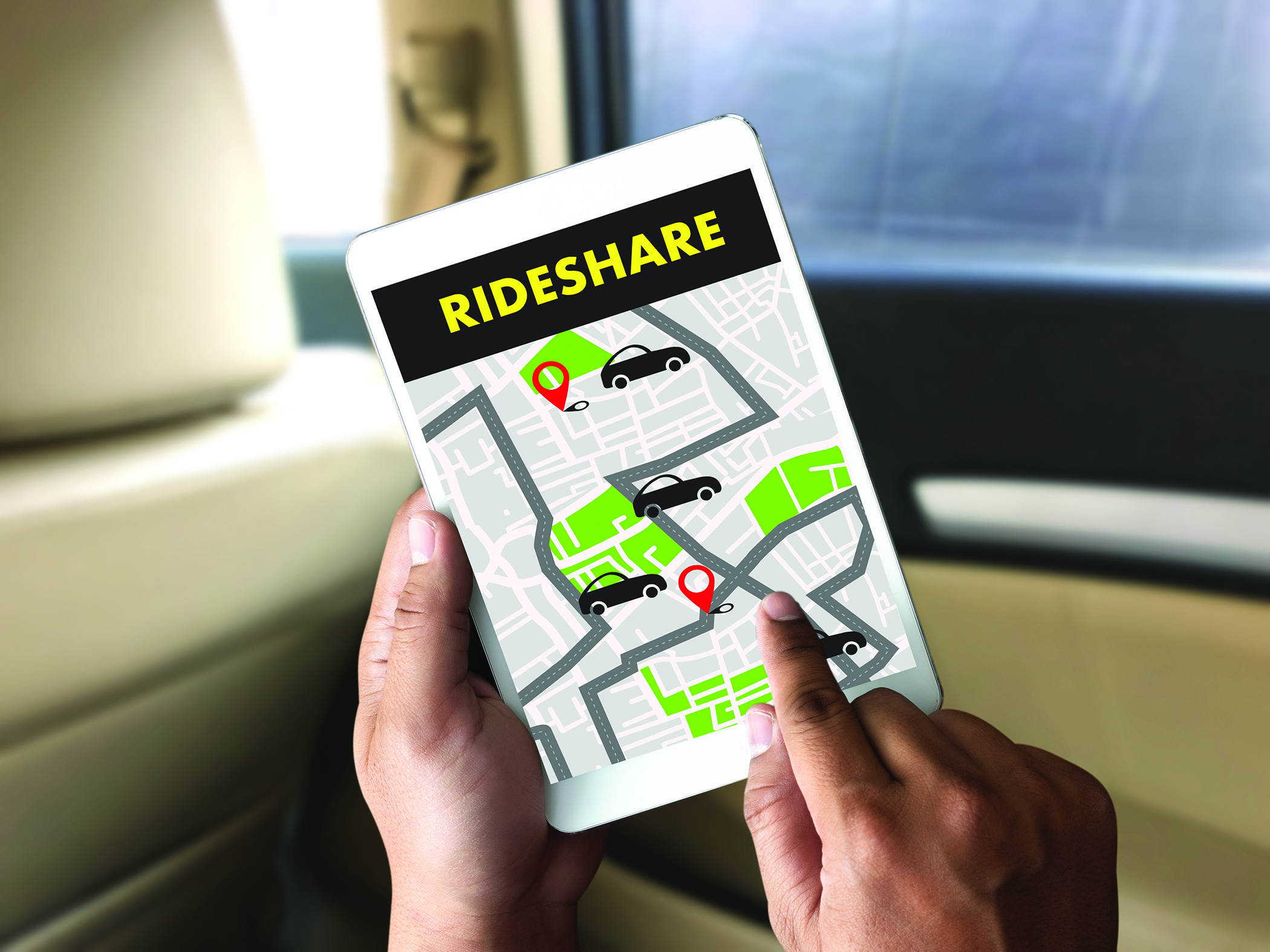 This is an image of someone holding a brochure for Rideshare