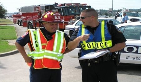 This is an image of a police officer and fire fighter.