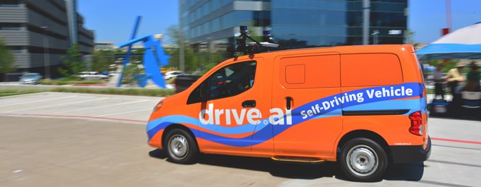 Image of a orange drive.ai car, a self driving vehicle