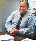 Michael Morris the director of NCTCOG Transportation sitting at a desk