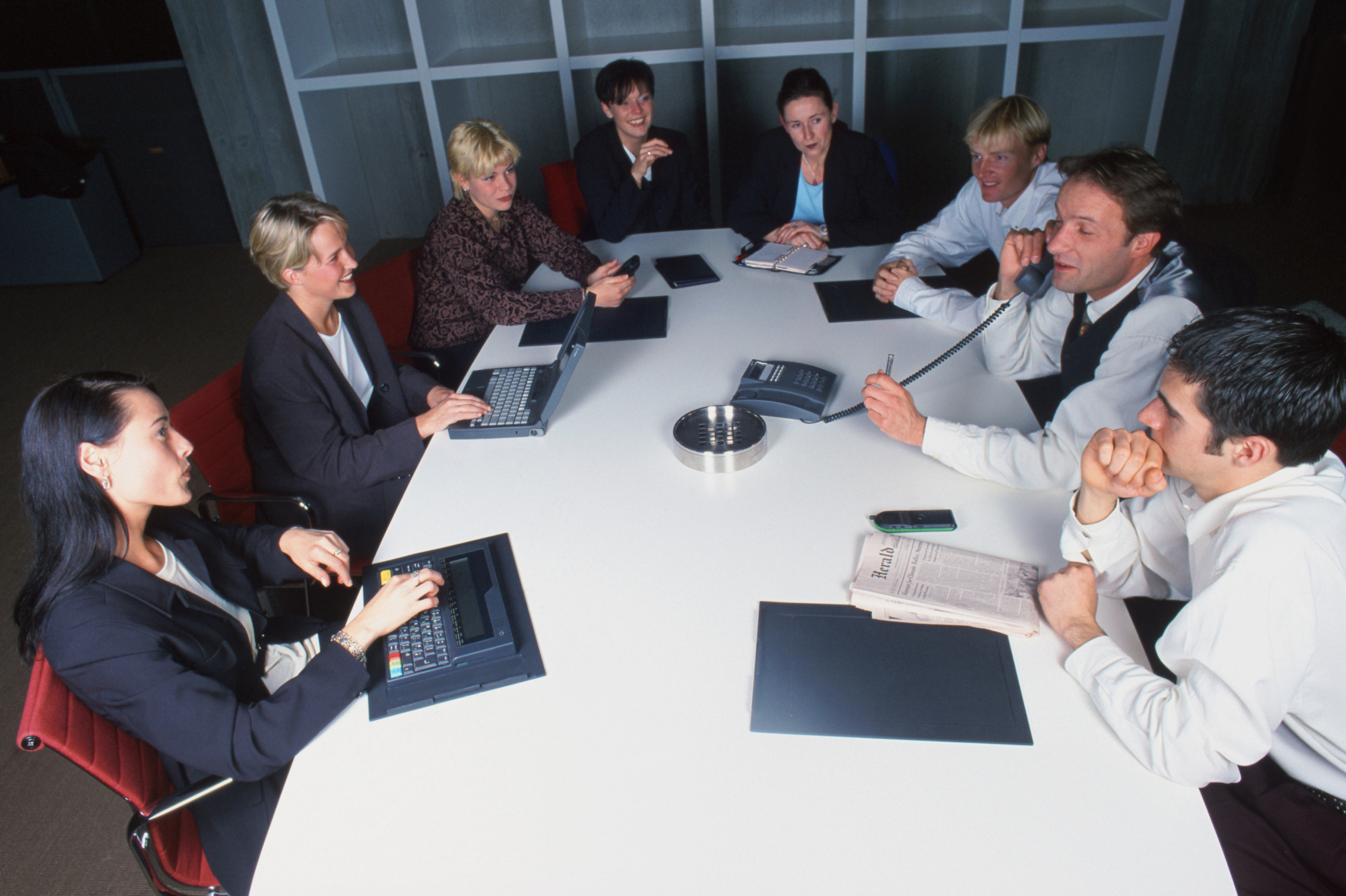 Group of people talking in a meeting